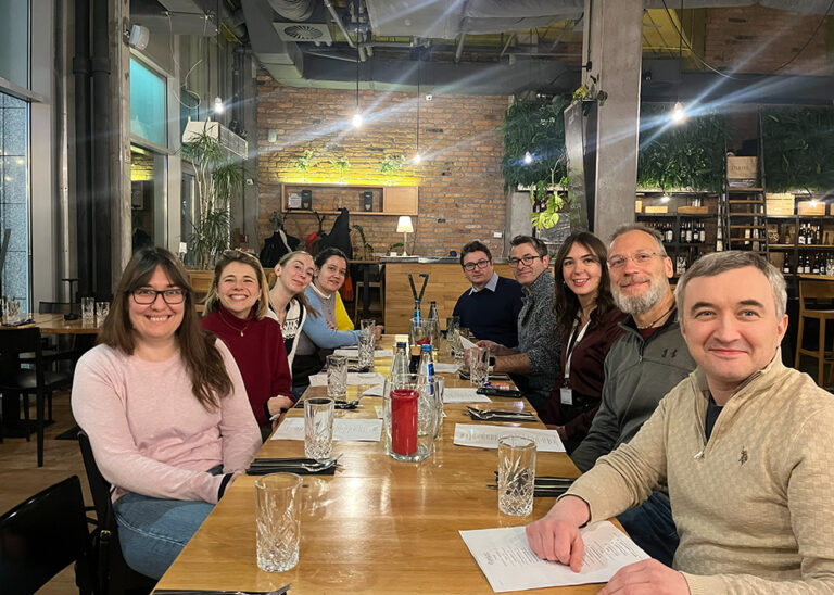 group of researchers in restaurant